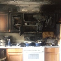 kitchen that had caught fire above stove